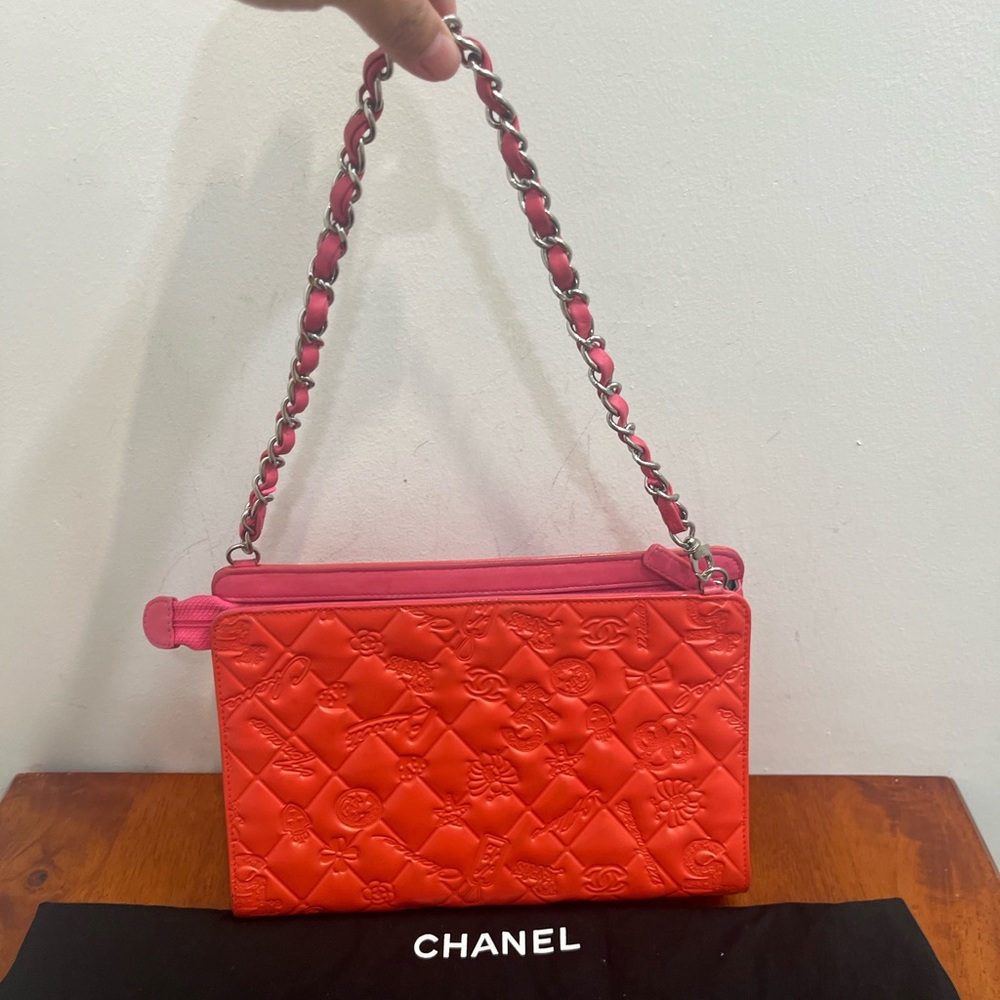 Authentic and Entrupy certified lucky symbols chanel pochette- excellent